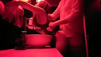 Gay Men Engage In Sexual Activity In The Restroom Of A Nightclub